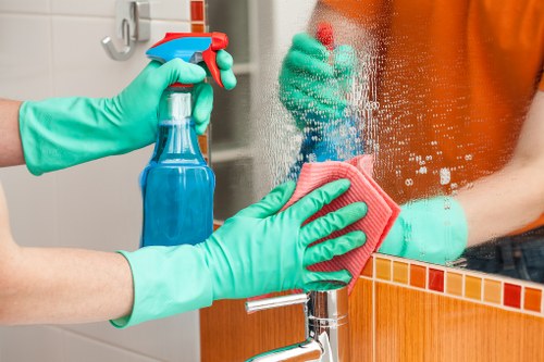 Carpet cleaning team preparing equipment safely before work
